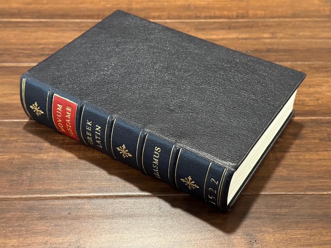 Full leather binding in black with red spine labels and gold tooling